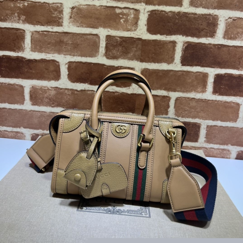 G*u*i top handle bags